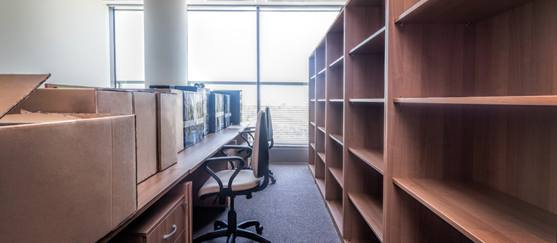 boxes on empty desk in office